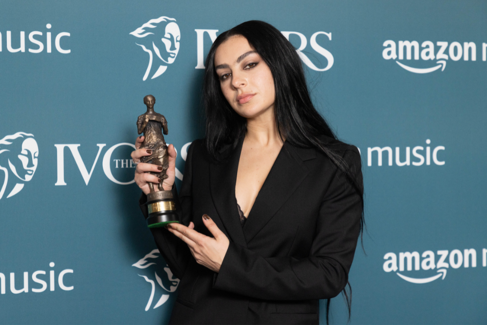Charli XCX with an Ivor Novello Award at The Ivors 2023