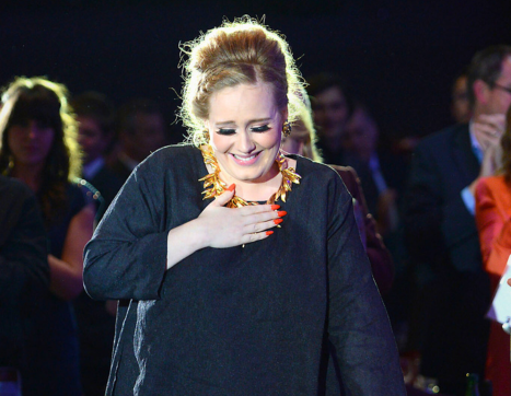 Adele winning songwriter of the year at The Ivors 2012