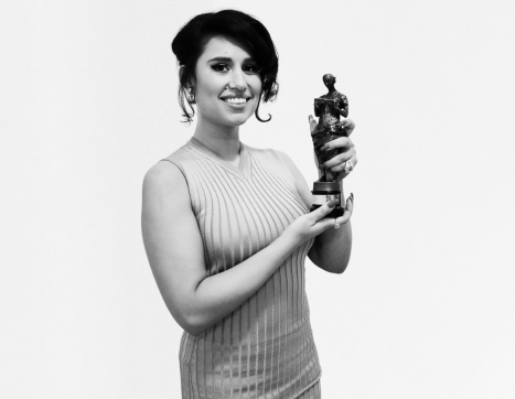 Raye with an Ivor Novello Award for Songwriter of the year