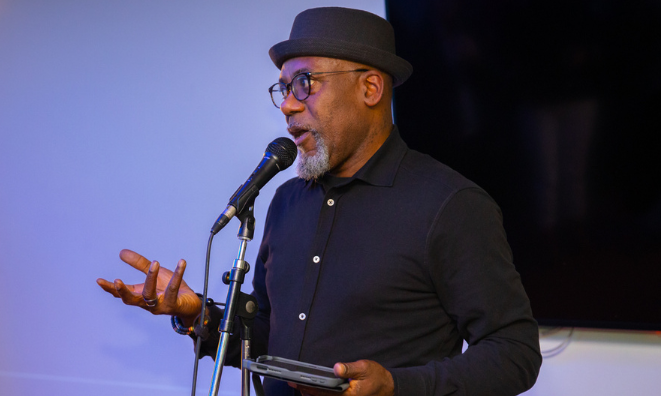 Oprhy Robinson speaking