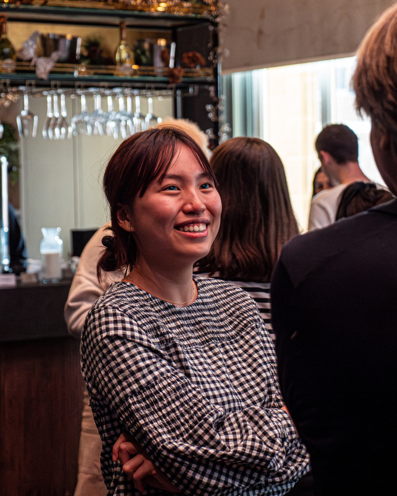 Person smiling and talking