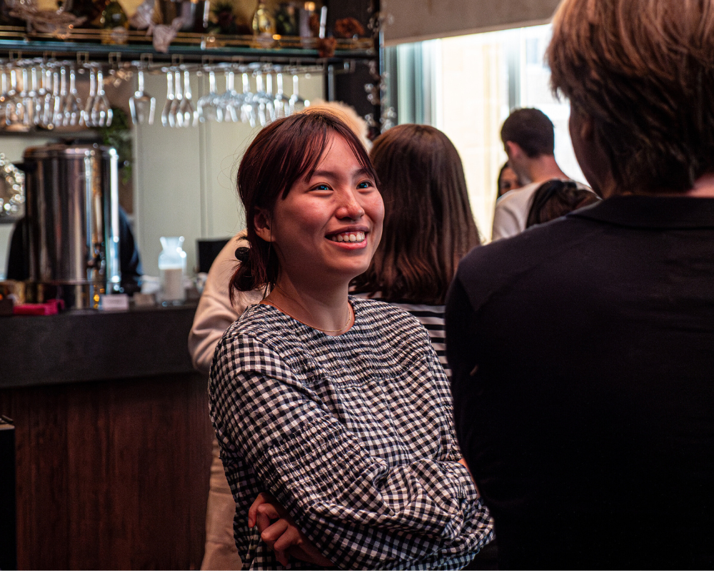 Person smiling and talking