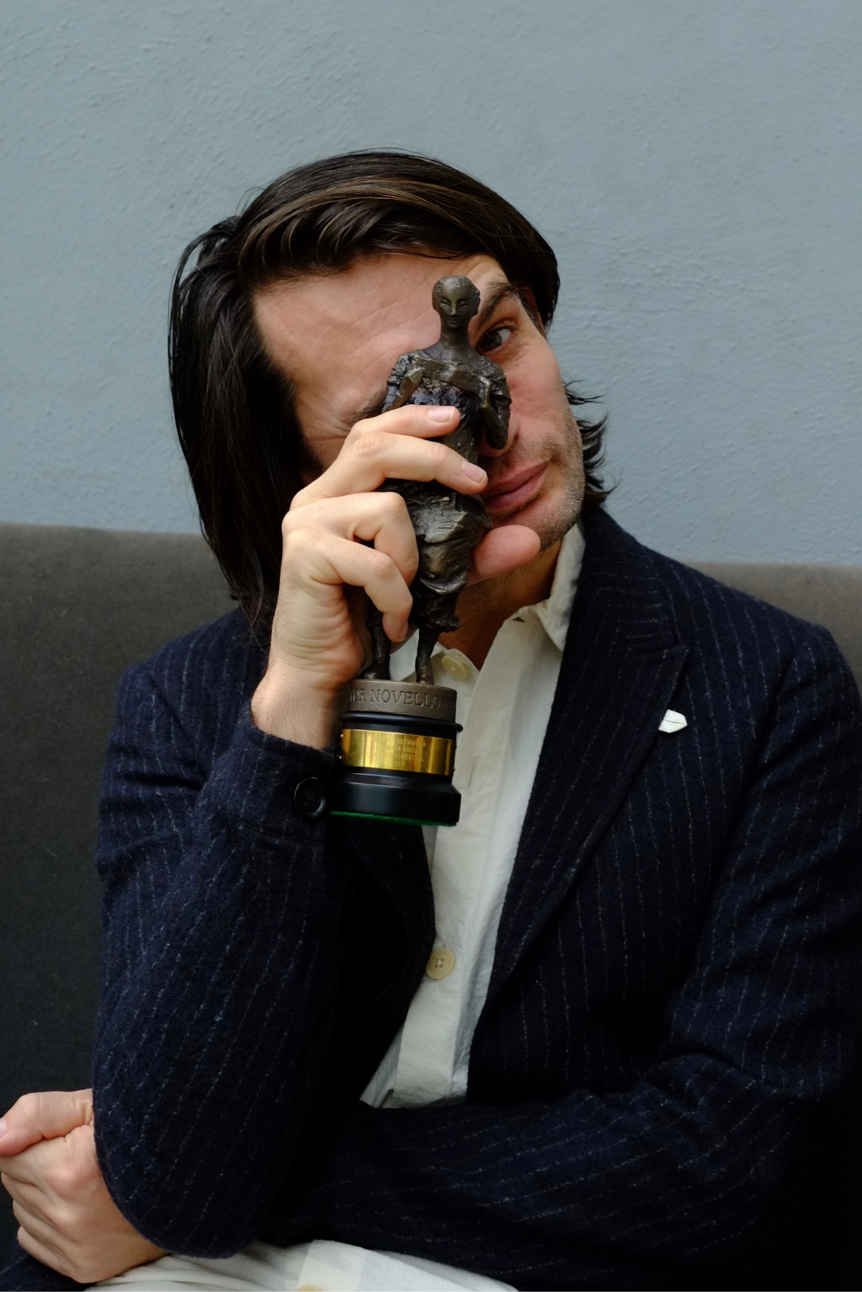 Jonny Greenwood with an Ivor Novello Award